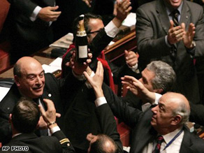 Italian opposition senators celebrate with champagne after the confidence vote in the Senate