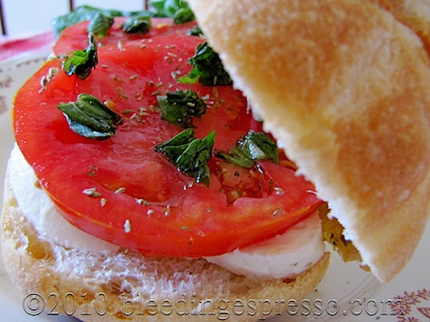 Panino Caprese Tomato Mozzarella and Basil Sandwich Bleeding