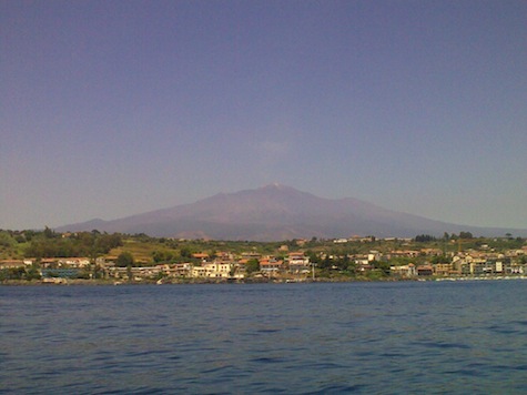 Mount Etna looms behind Calabria